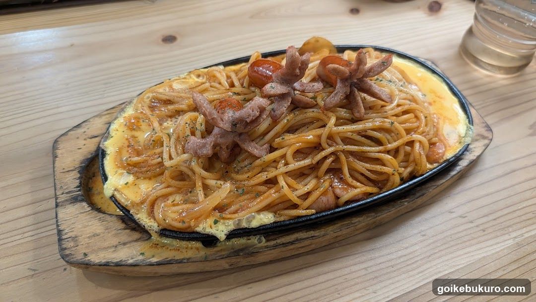 Sausage and Tomato Pasta with Egg Topping