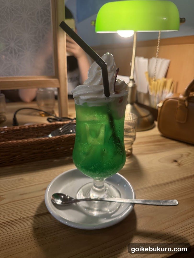 Green Iced Drink with Whipped Cream
