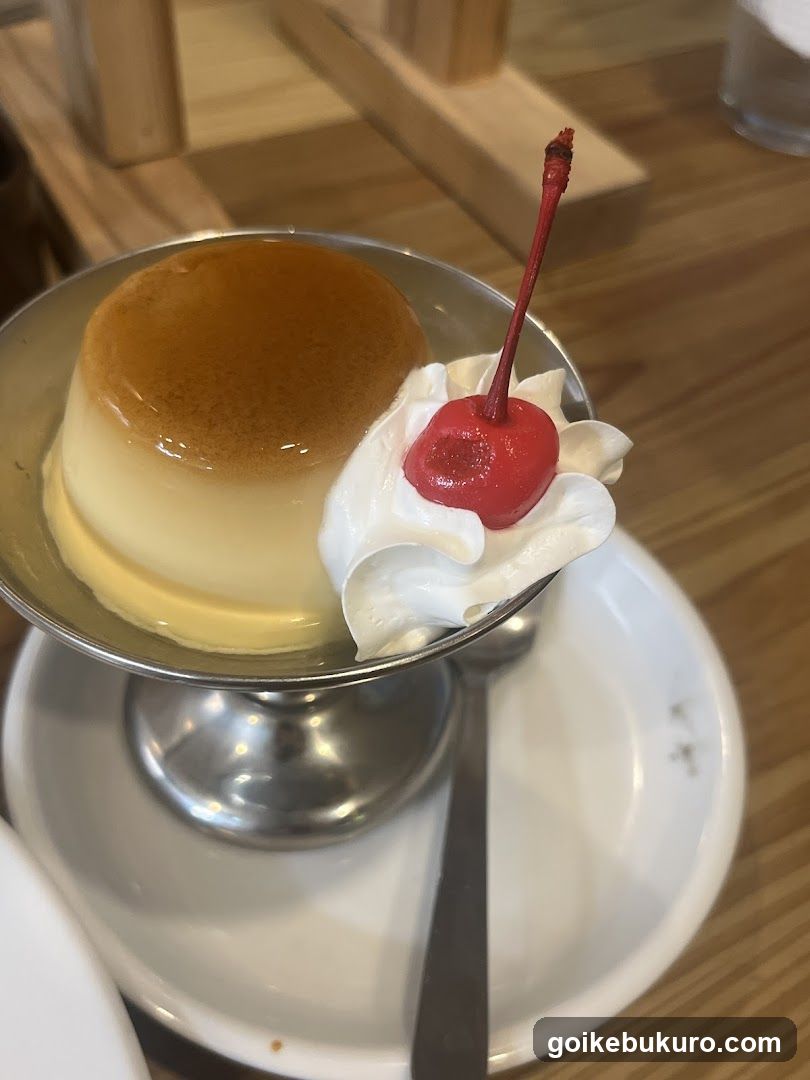 Pudding with Cherry and Whipped Cream