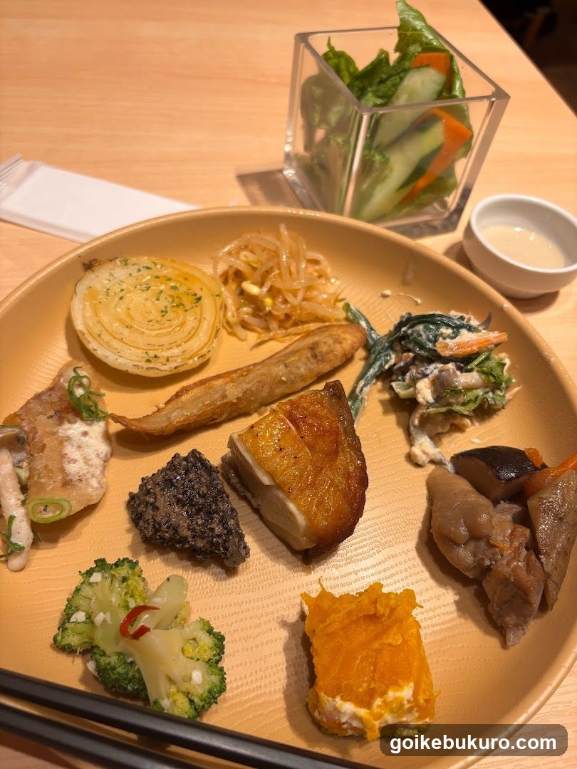 Japanese-style appetizer platter with side salad