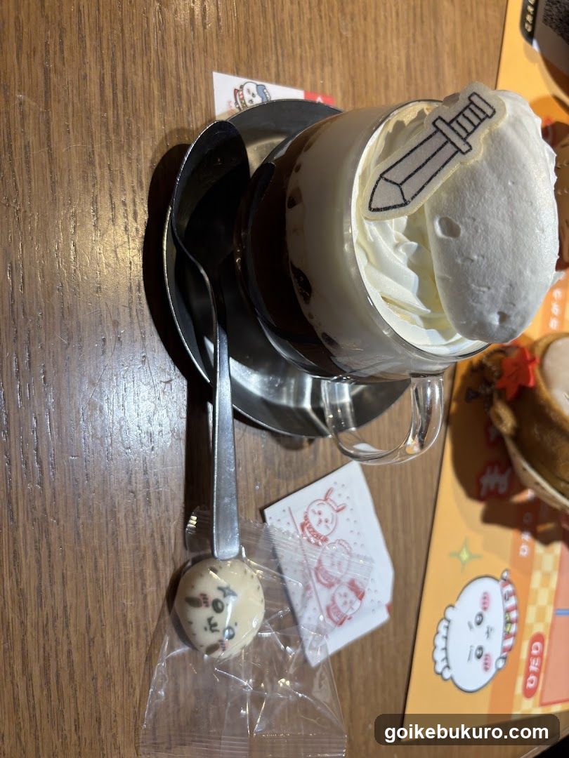 Dessert with whipped cream and spoon