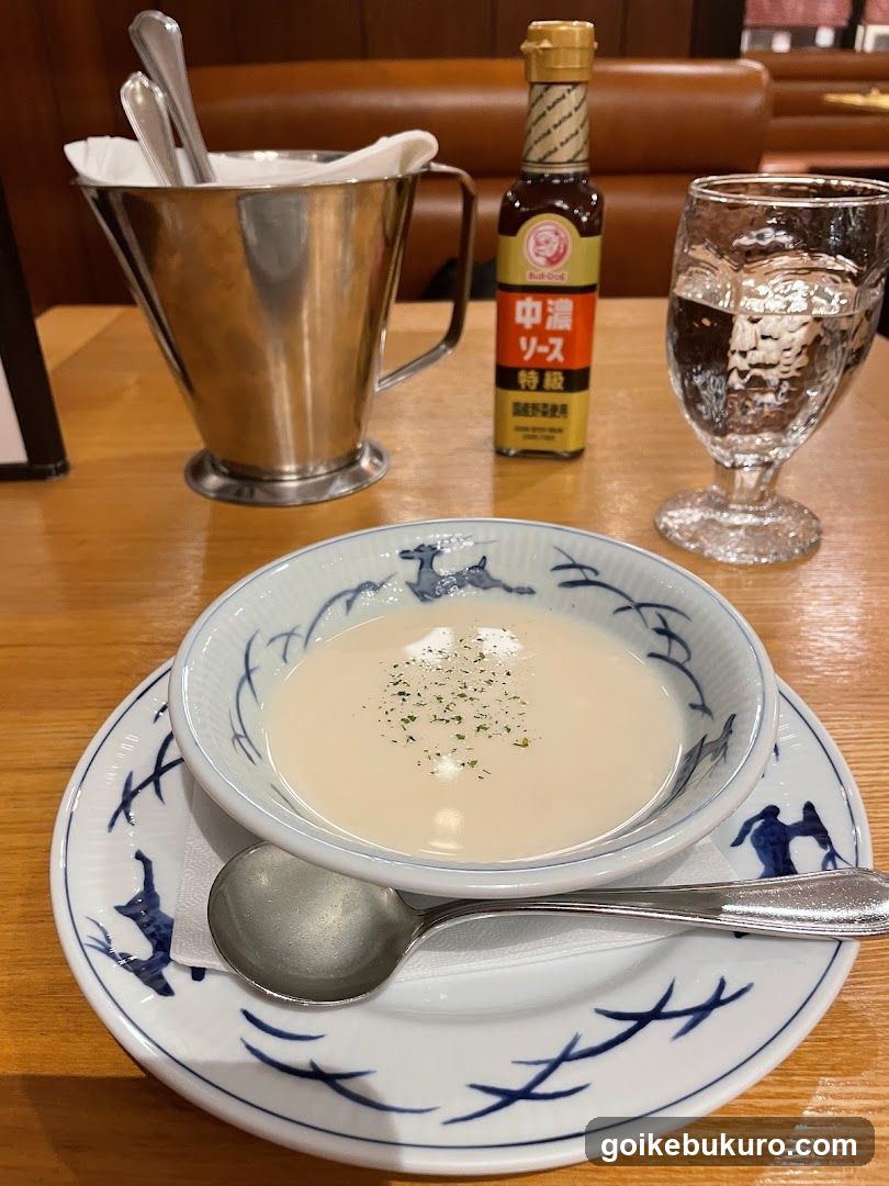 Dining Table Setting with Soup and Condiments