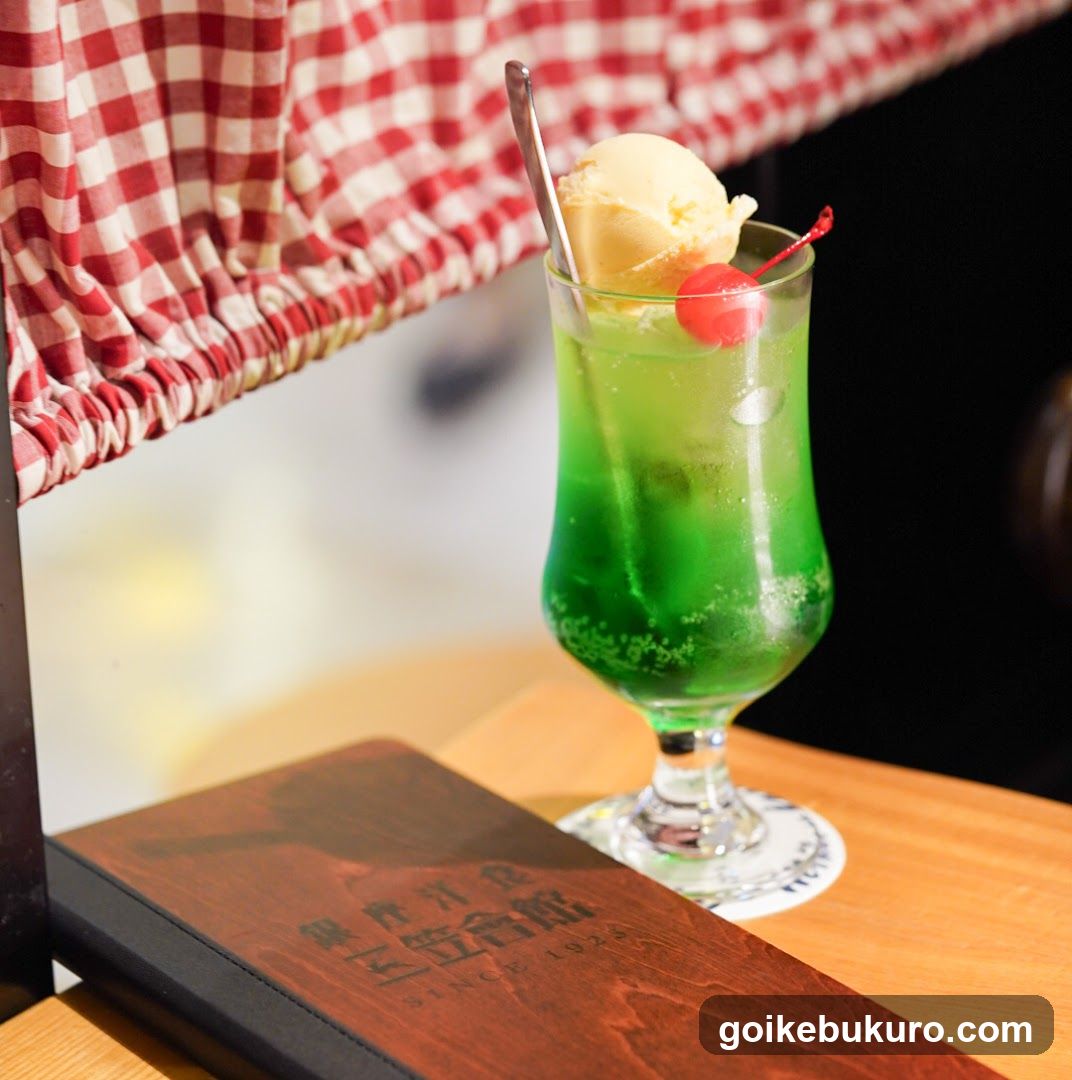 Green cocktail with ice cream