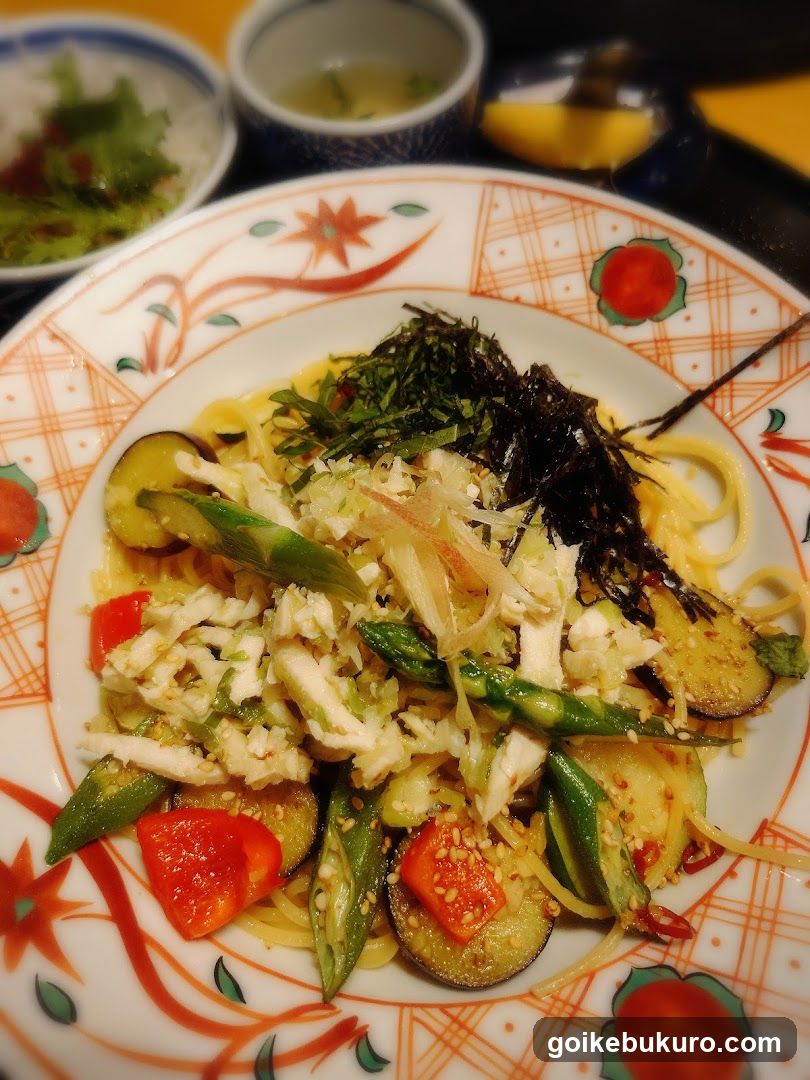 Japanese-style noodle dish with vegetables and seaweed