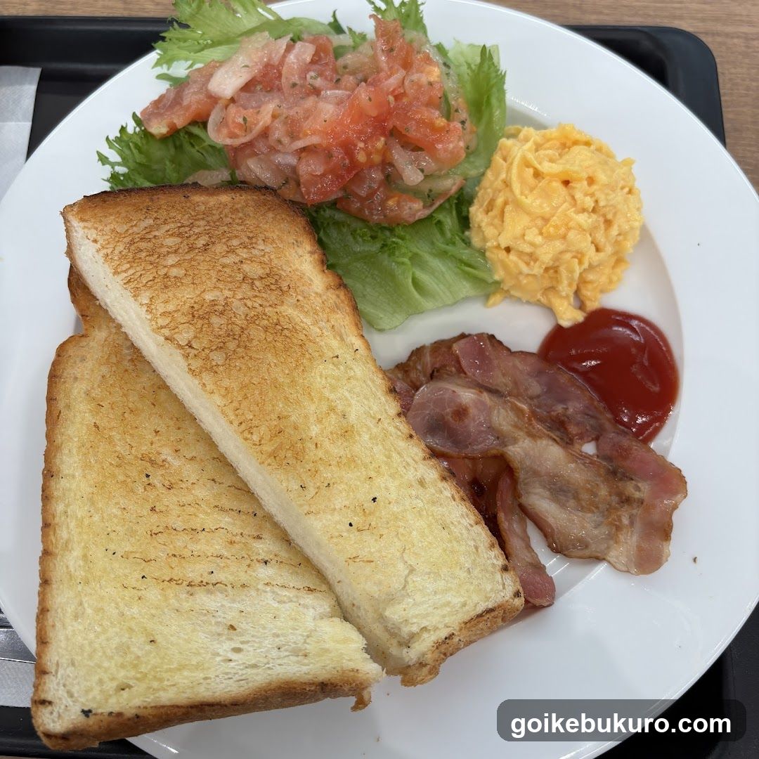 Breakfast Plate with Toast, Bacon, Scrambled Eggs and Salad