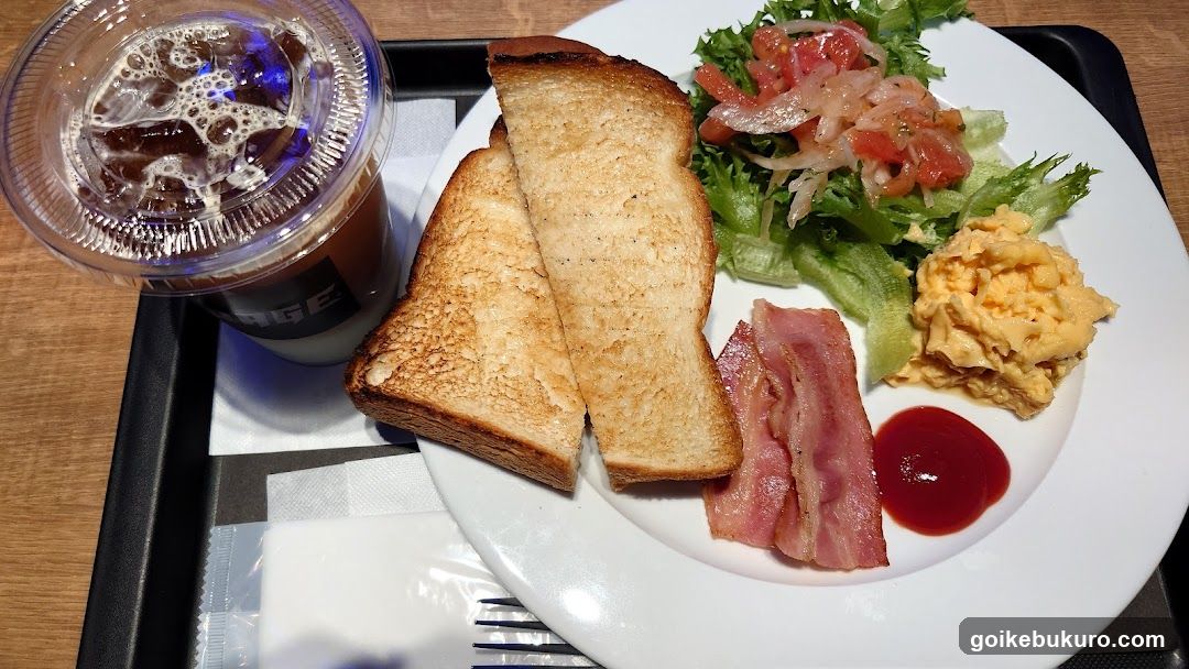 Breakfast Plate with Toast, Bacon, Salad and Drink