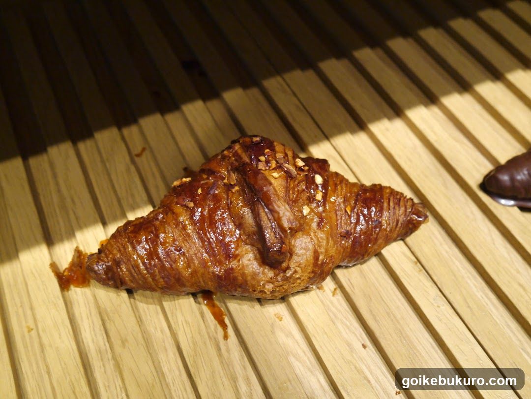 Croissant on wooden slats