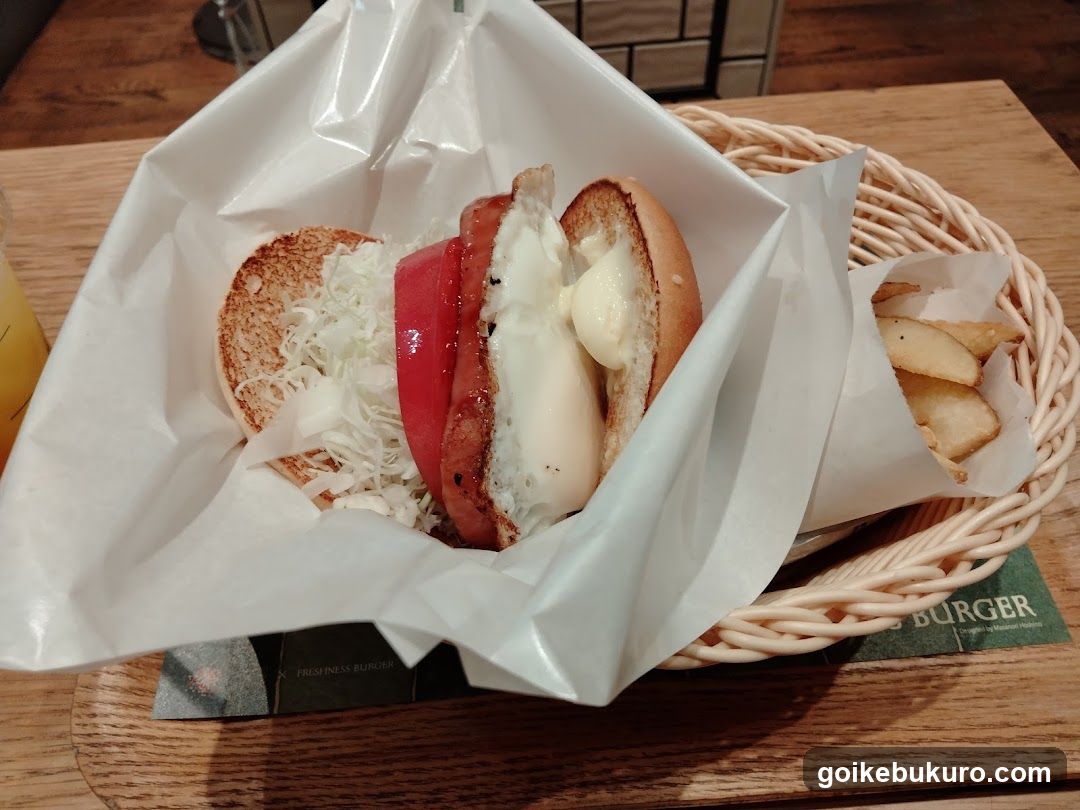 Burger with Fried Egg and Shredded Cheese