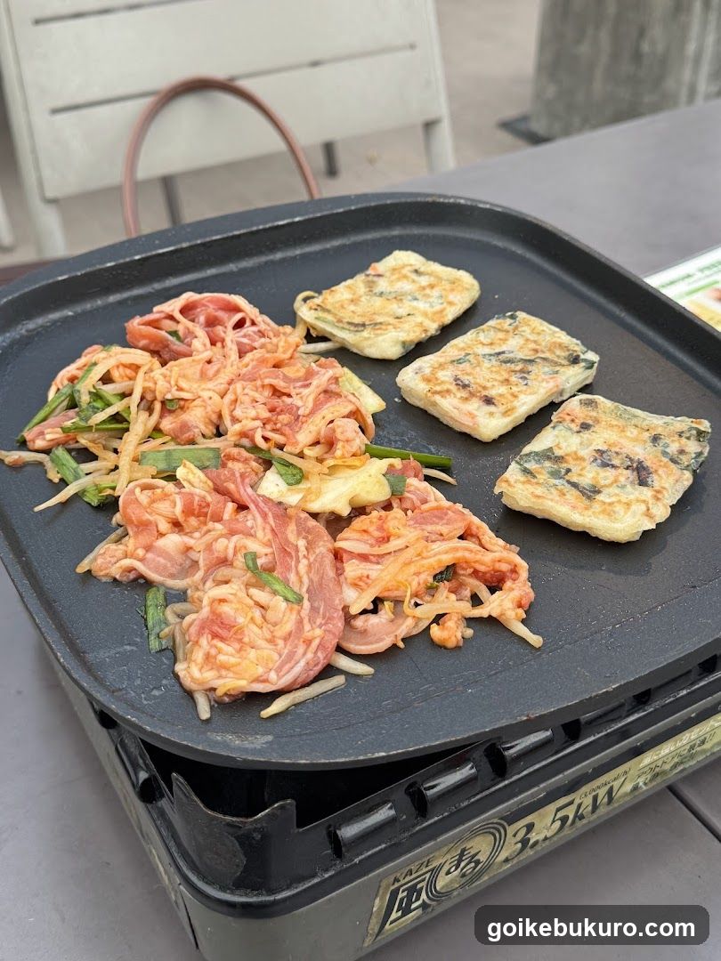 Grilled Korean-style food on portable stove