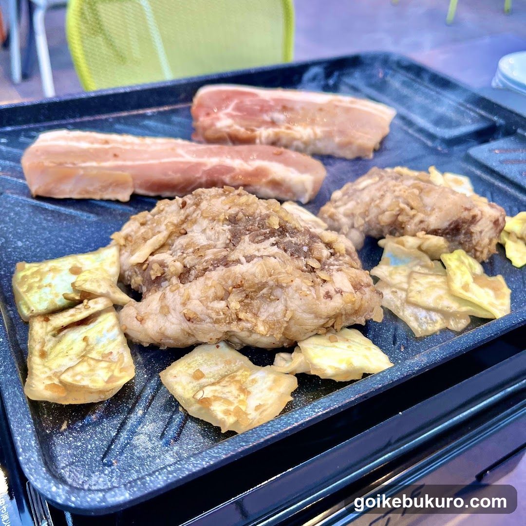 Grilled Meat and Tofu on a Black Grill
