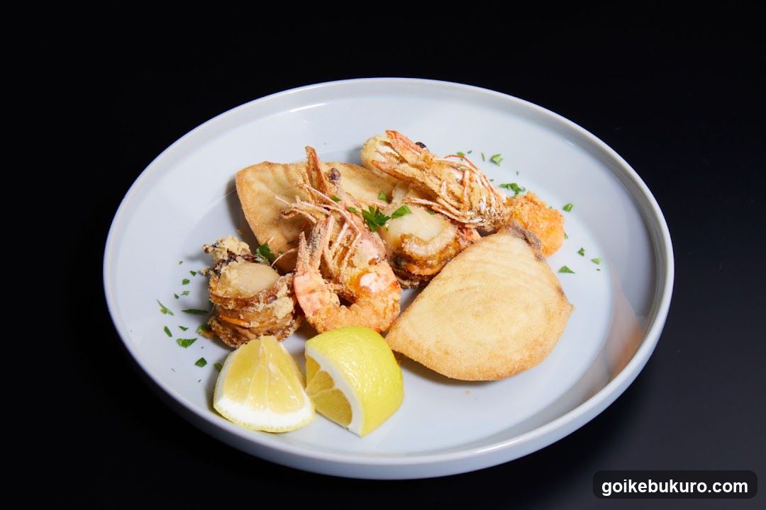 Fried Seafood Platter with Lemon Wedges