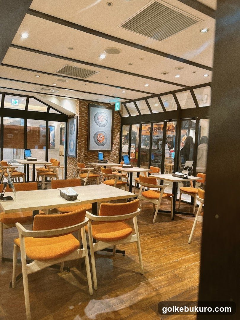 Restaurant Interior with Orange Chairs and Wooden Floors