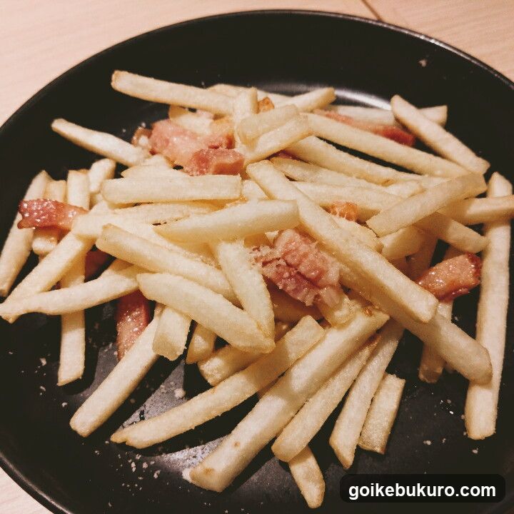 Bacon Fries on Black Plate