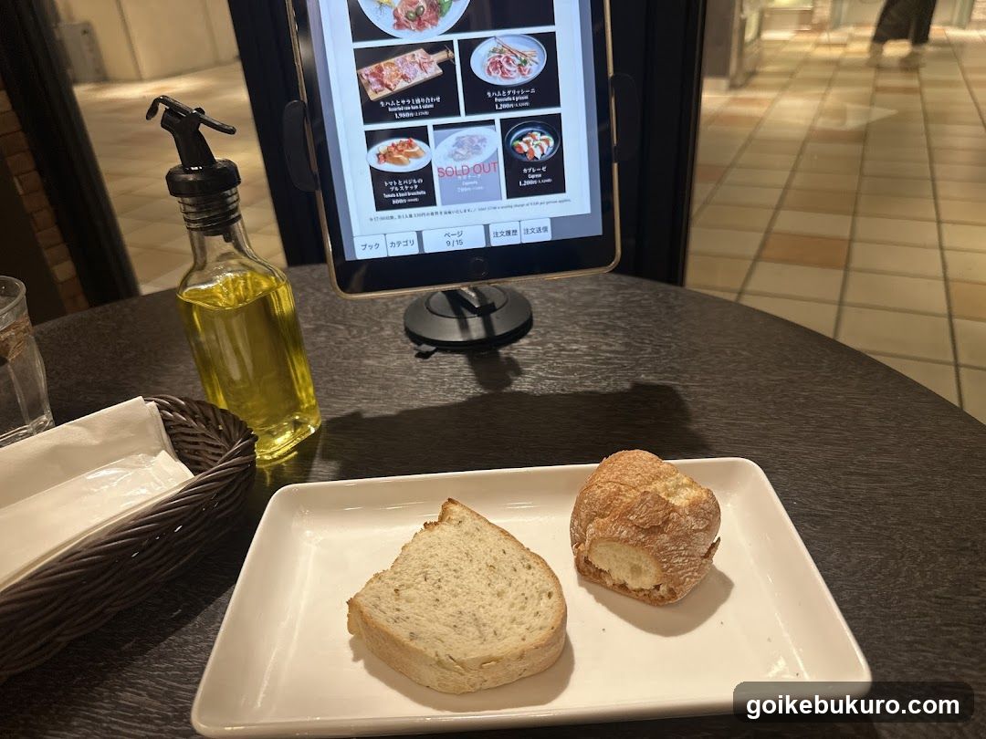 Bread and Oil at a Restaurant Table