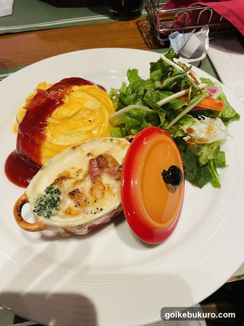 Plate with Omelette, Salad and Baked Dish