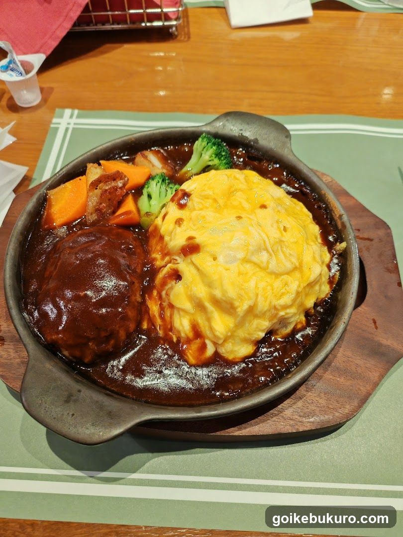 Sizzling Omelette and Meat Dish