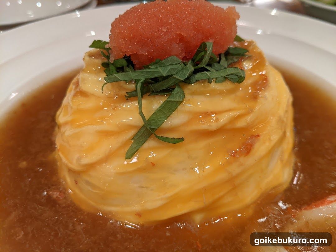 Egg Roll in Bowl with Sauce and Garnish