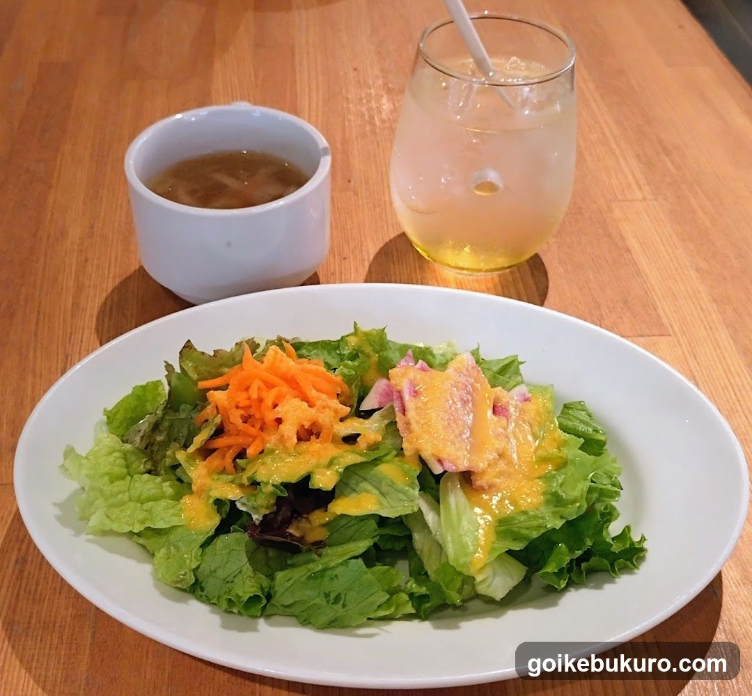 Salad with Dressing and Drink