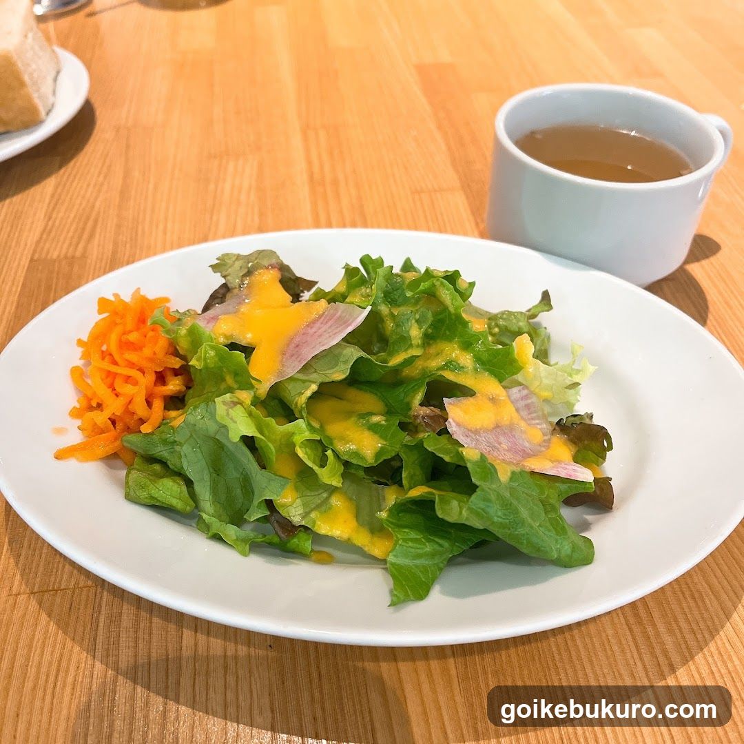 Salad with dressing and carrots