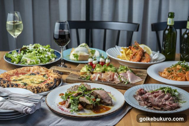 Gourmet Table Setting with Various Dishes