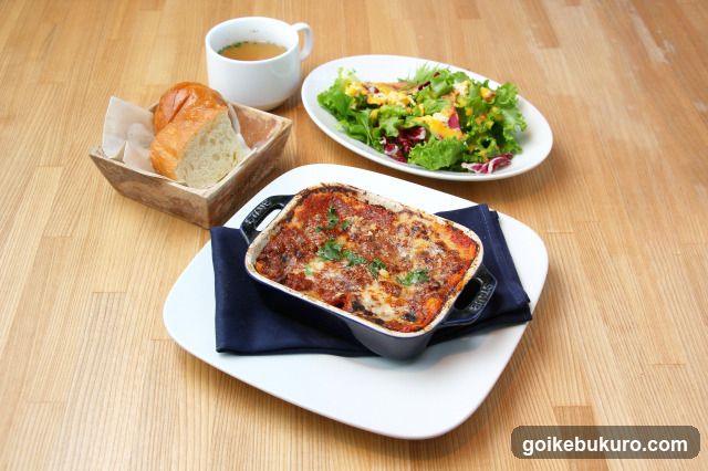 Lunch Meal with Lasagna, Salad, Soup and Bread