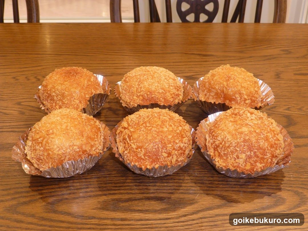 Coconut-Crusted Desserts on a Wooden Table