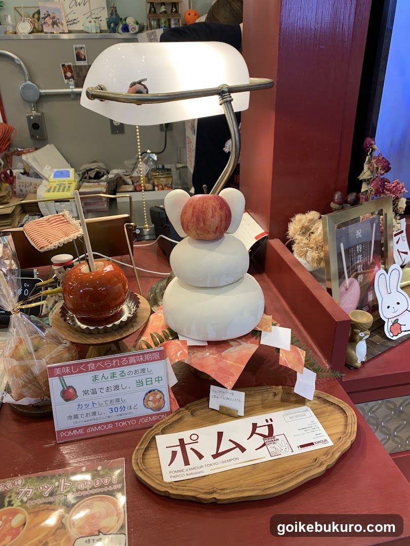 Display Table with Decorative Items and Signage
