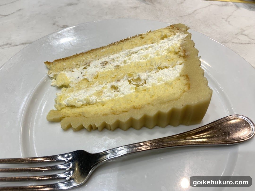 Slice of Layered Cake on Plate
