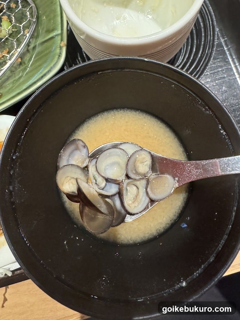 Clam Soup with Clams on Spoon