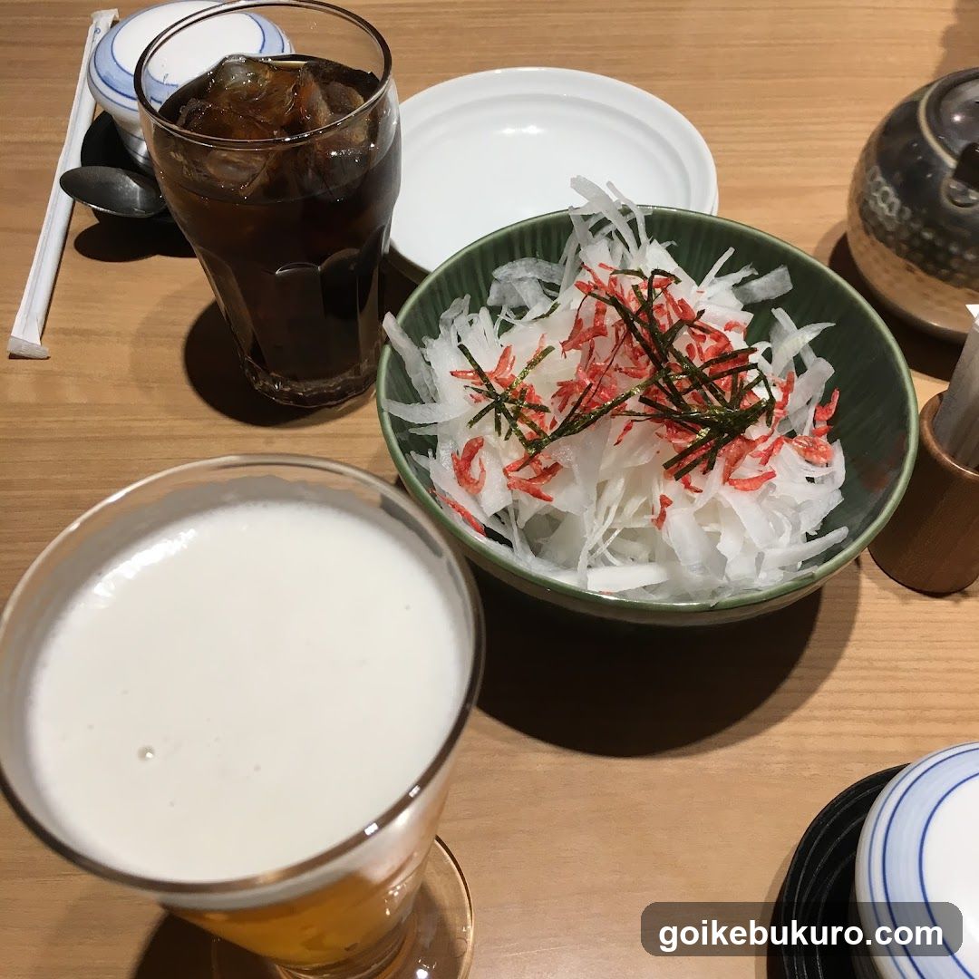 Japanese Table Setting with Drinks and Side Dish