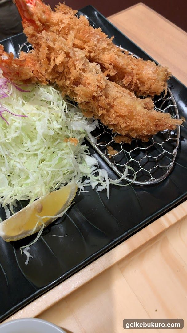 Tempura with Shredded Cabbage and Lemon Wedge