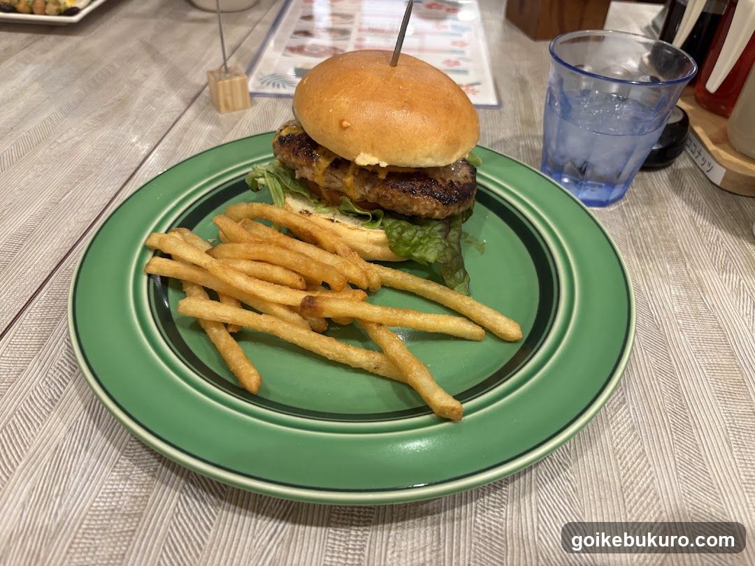 Burger and Fries on Green Plate