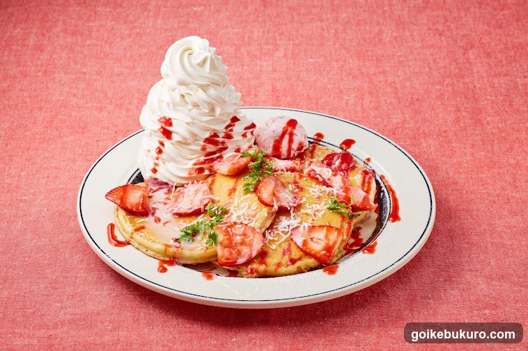 Strawberry Pancakes with Whipped Cream and Syrup