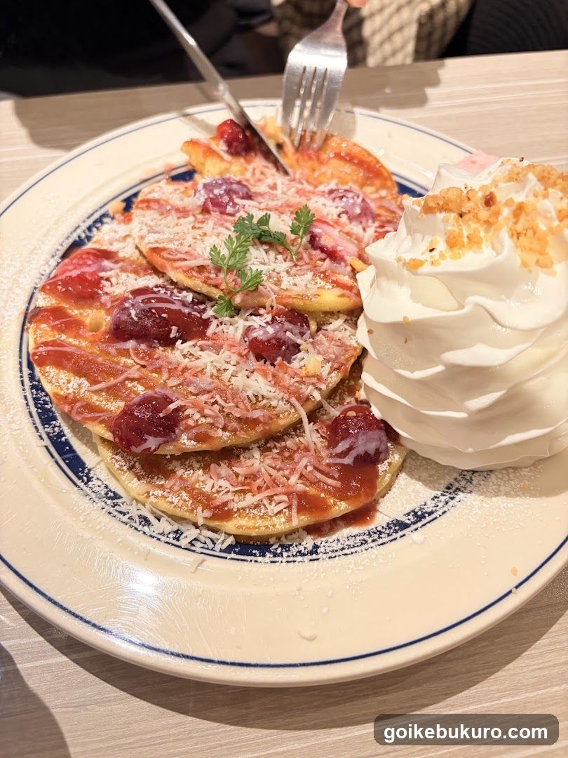 Pancakes with Whipped Cream and Strawberries