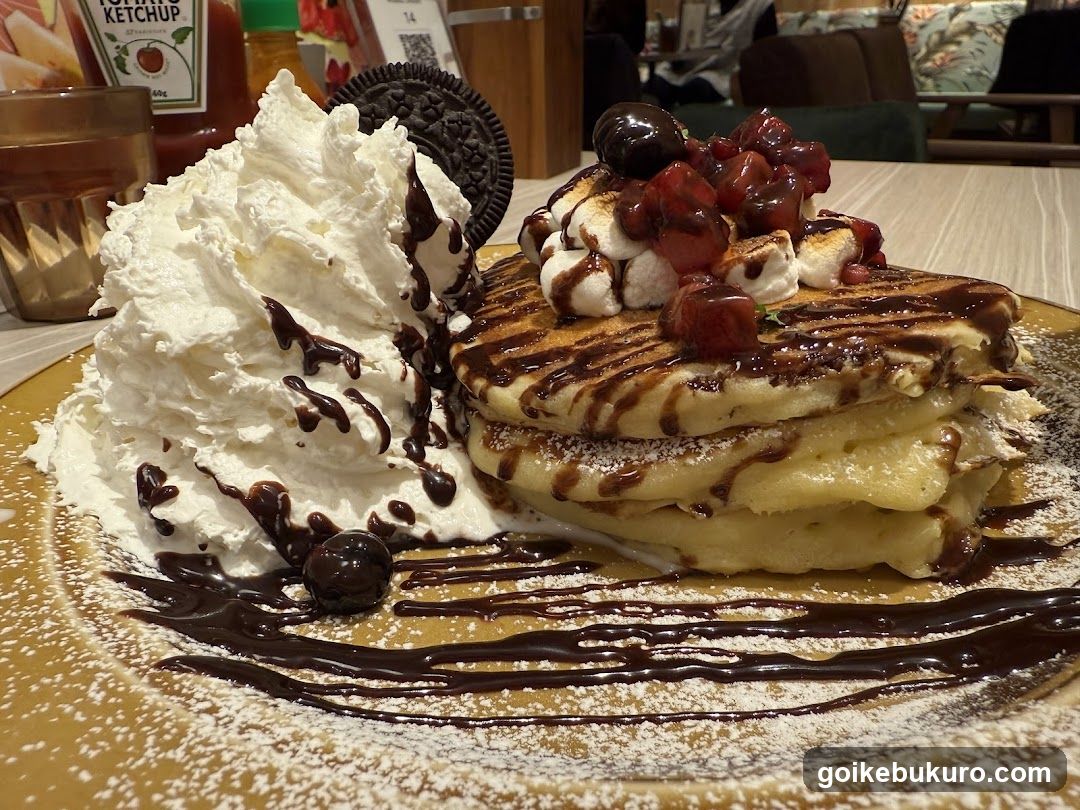 Pancake with toppings and whipped cream