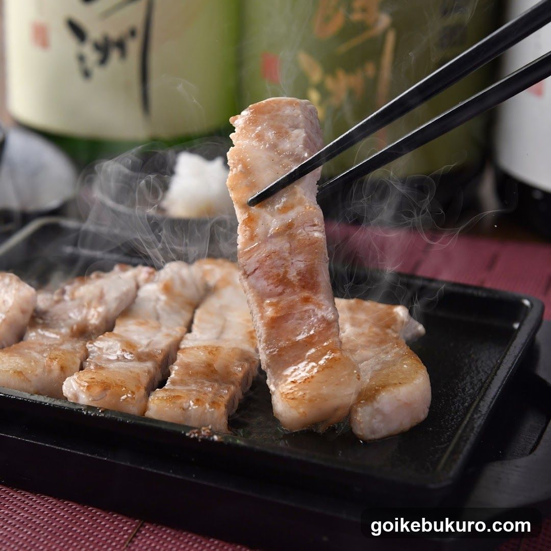 Grilled Pork Slices on a Hot Plate