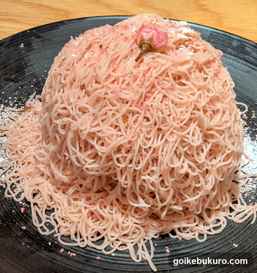 Pink Noodle Dish with Rose Garnish