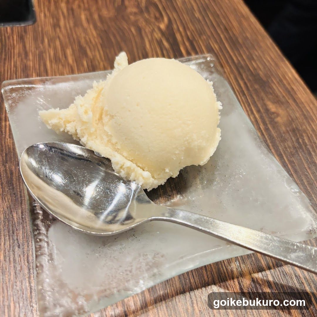 Scoop of Ice Cream on Glass Plate