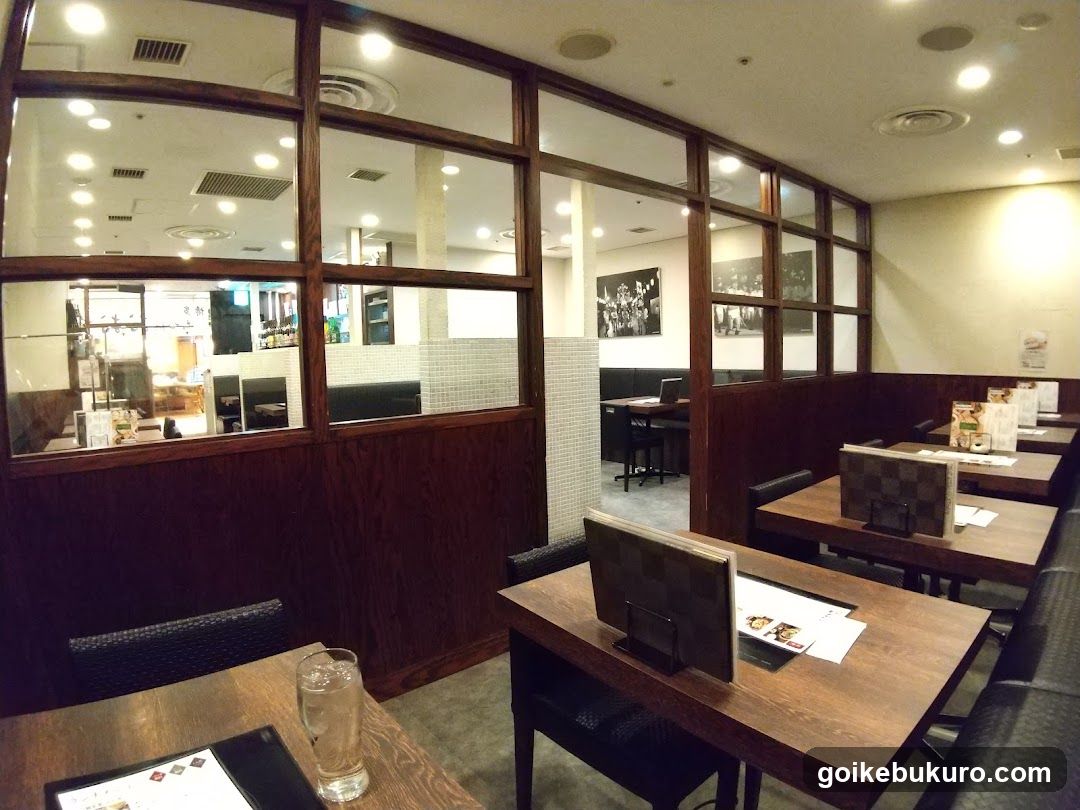 Restaurant Interior with Wooden Tables and Glass Partitions