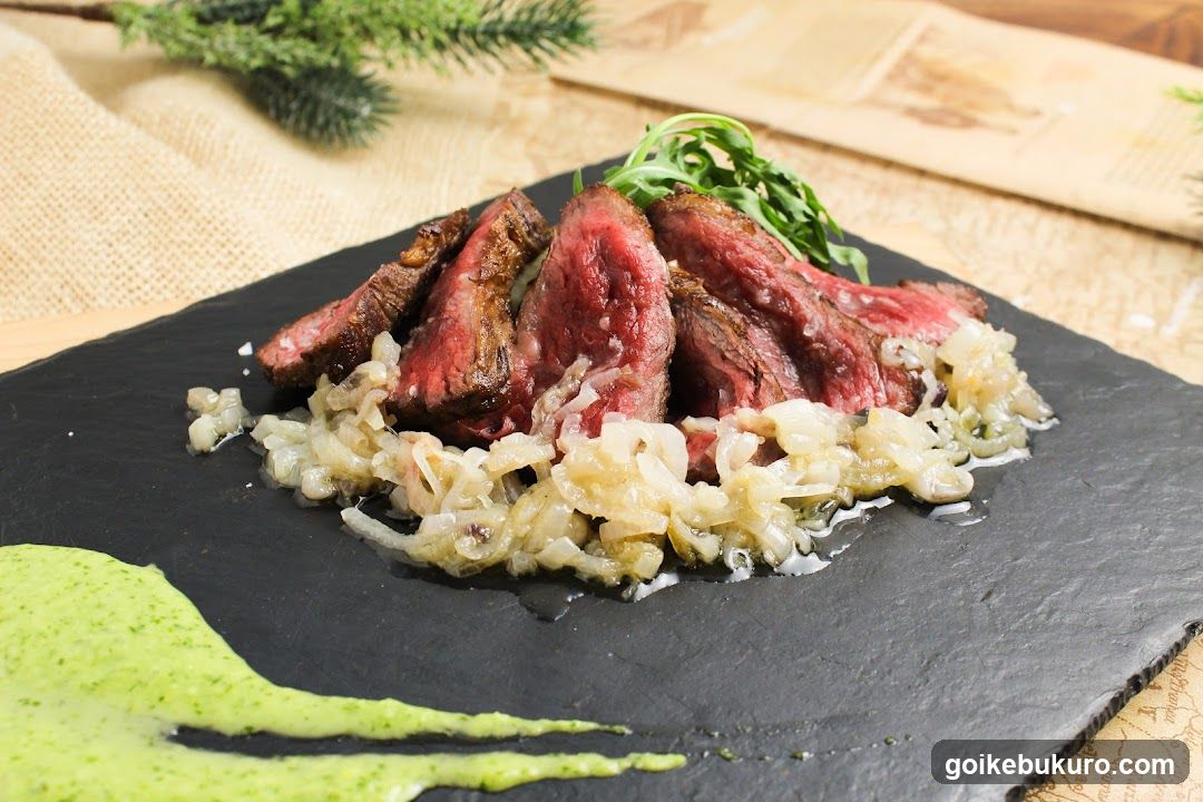 Sliced Steak with Onions and Green Sauce