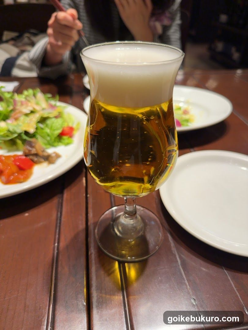 Beer and Salad at Restaurant Table