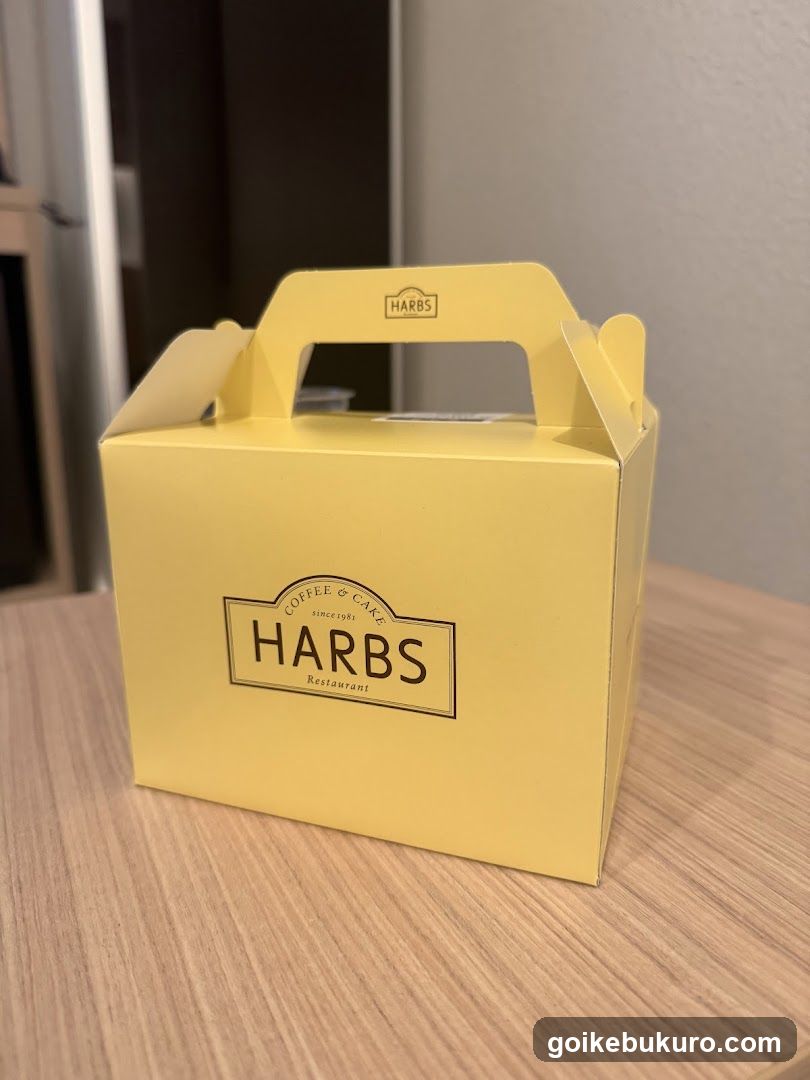 Yellow HARBS Takeout Box