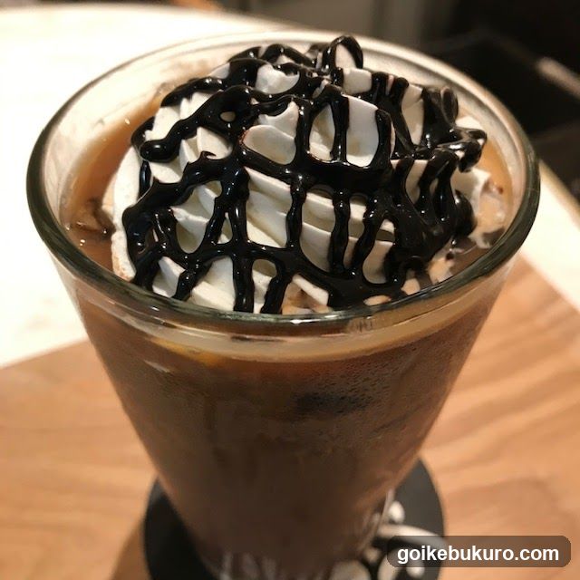 Iced Coffee with Whipped Cream and Chocolate Drizzle