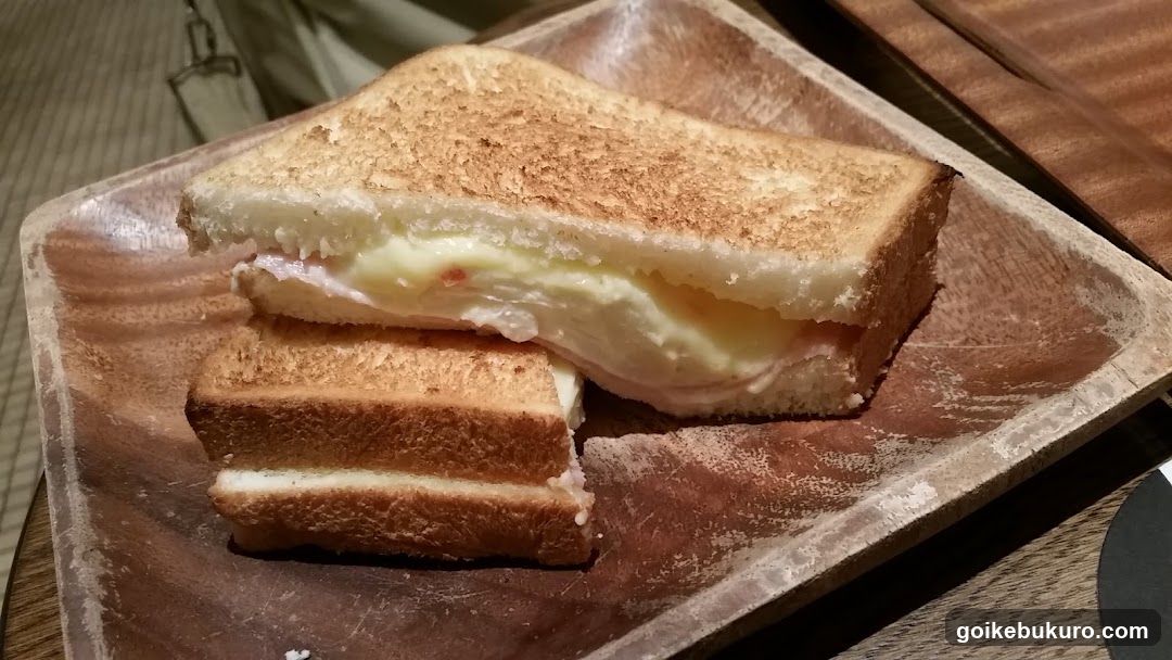 Grilled Sandwich on Wooden Plate