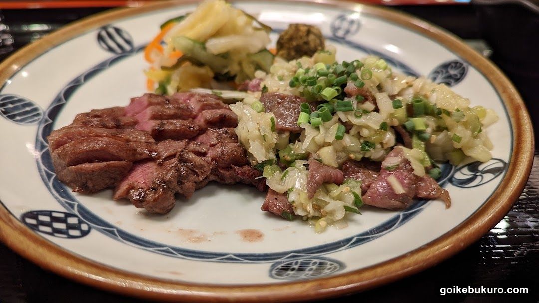 Sliced Beef and Side Dish on Plate
