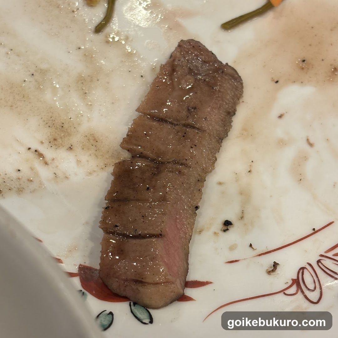 Sliced Steak on Plate