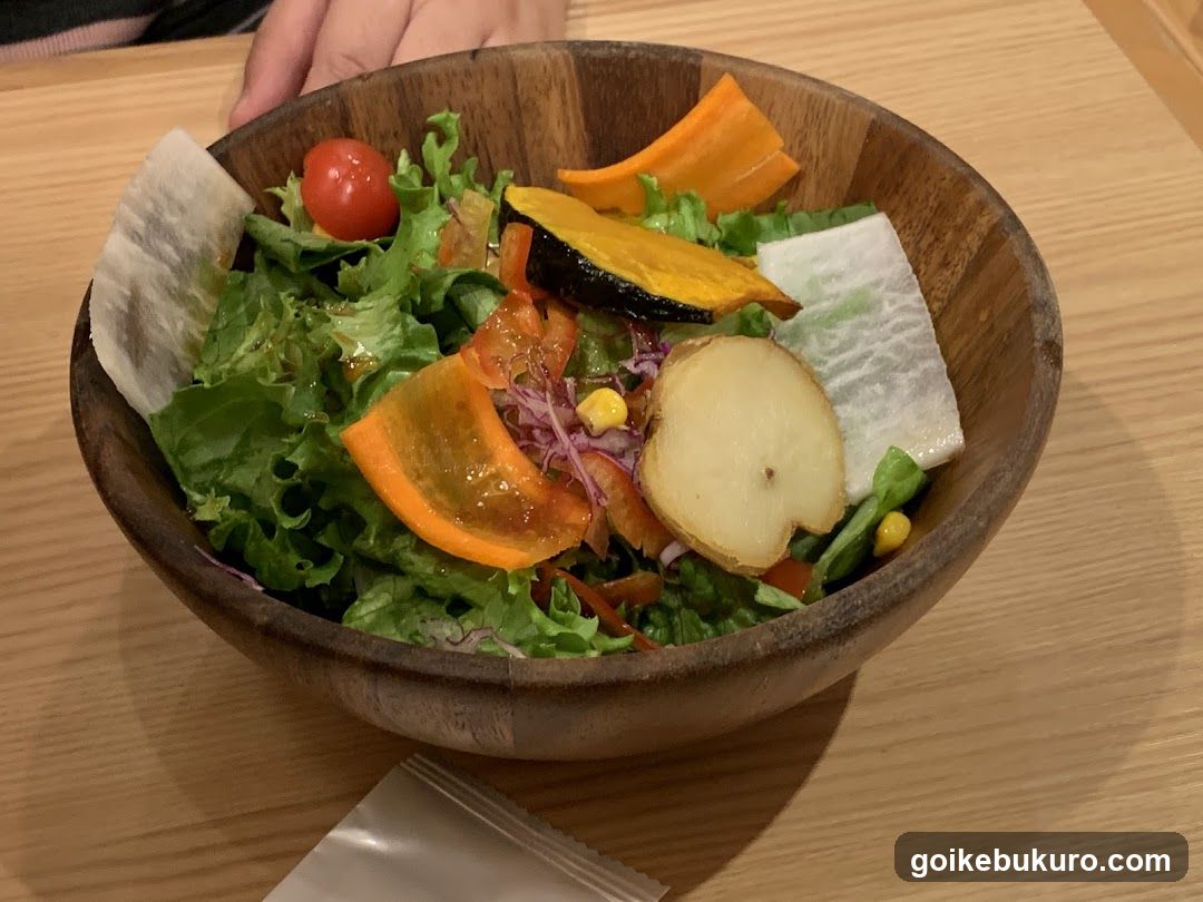 Wooden Bowl Salad with Sweet Potato and Lettuce