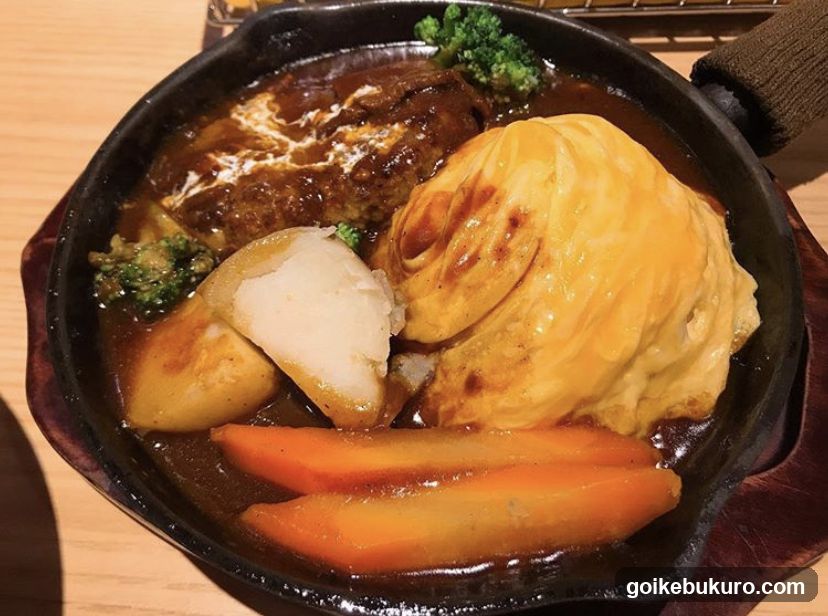 Curry Rice with Omelette and Meat