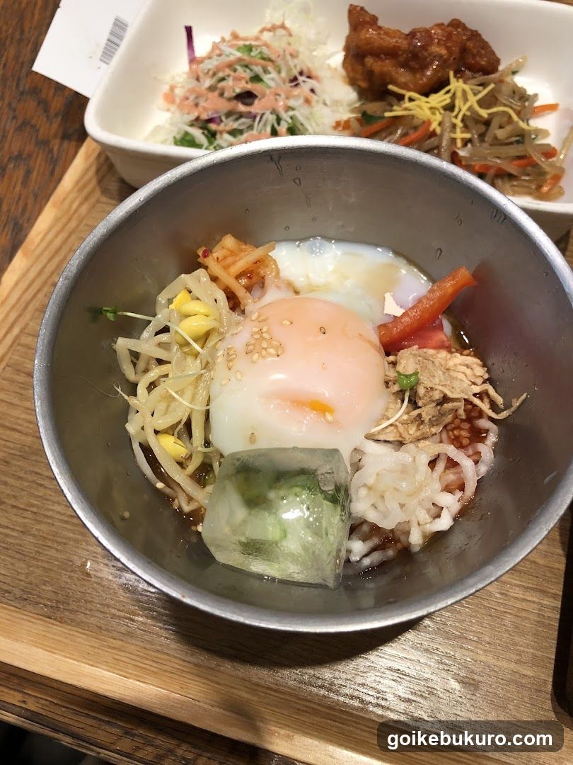 Bowl with Egg and Side Dishes