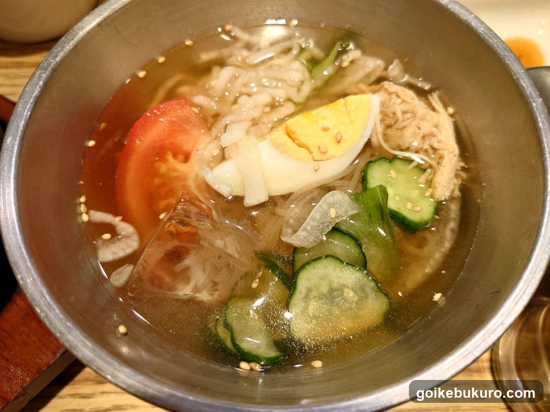 Bowl of Noodle Soup with Vegetables and Egg